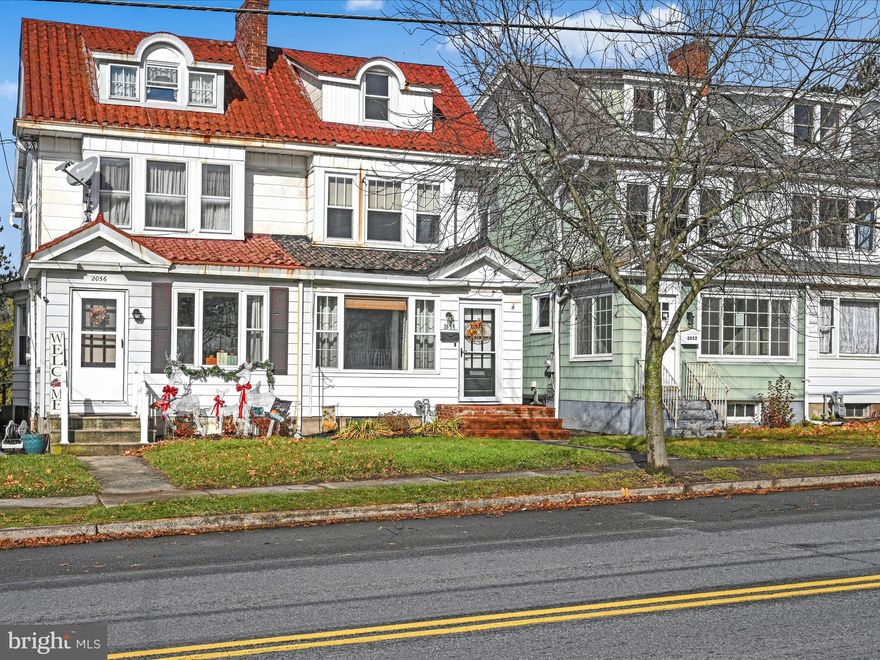 This lovely home nestled in the Yorkville section of Pottsville presents an enticing opportunity for those seeking a townhouse-style home without the burden of HOA fees.  This charming residence minimizes yard maintenance while maximizing living space.  The inviting entry room with large picture window is ideal for a variety of uses.   Step into the spacious formal living where sophistication meets comfort.  The focal point is a decorative fireplace and a small built-in bookcase that offers a tasteful display for you literary treasures or cherished collectibles.  The formal dining room boasts new laminate flooring, setting the stage for formal meals.  The kitchen, complete with breakfast booth, caters to both functionality and comfort.  A mudroom easily  connects  to a sizable deck perfect for outdoor enjoyment.  The second floor provides ample accommodations for family or guests.  The full bathroom features a tub/shower combination, ensuring convenience for daily routines.  An exciting prospect lies in the walk-up attic, offering the potential for additional living space, perhaps a cozy retreat or home office.  The property's full basement extends the possibilities for extending your lifestyle.  A built-in heated garage adds practicality, enhancing the overall appeal of this home.  Parking beneath the deck further optimizes space utilization.  Located in a convenient setting, this residence  offers a compelling choice for those seeking a harmonious blend of comfort & practicality.  Schedule your visit today & envision the possibilities that await in this welcoming residence.  Yes you can be in your new home for the holidays!!