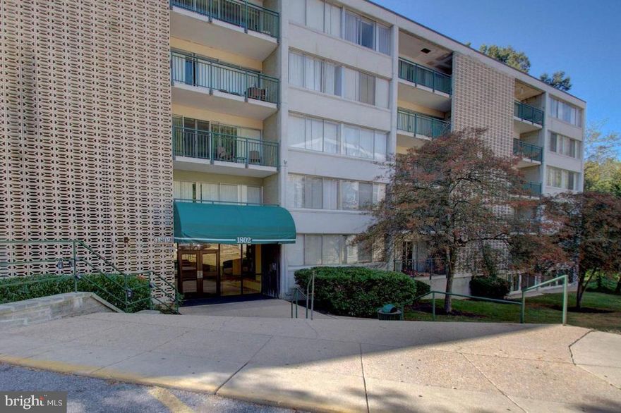 Great Location, new floor, fresh paint, large balcony  facing back to woods.