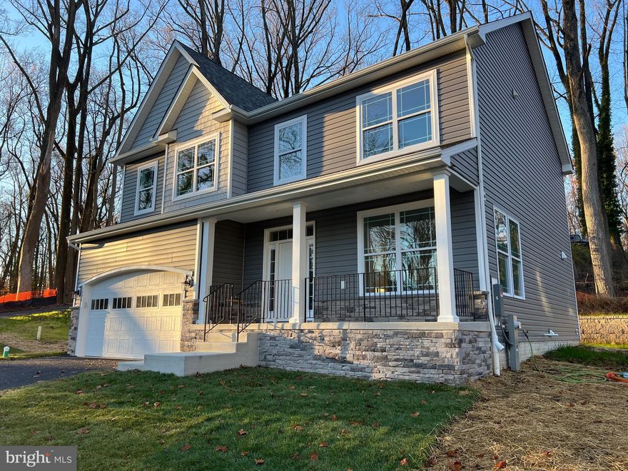 APPLETREE HOMES LLC..... NEW CONSTRUCTION.!!!  SEVERNA PARK SCHOOLS!!!    1 .15 Acre+ wooded lot!!! 5 Bedrooms 3.5 Baths.    9-Foot Ceilings on 1st Floor.    Beautiful Custom Kitchen with Quartz Countertops,  Stone Backsplash,  42" Cabinets, Stainless Farm Sink.  Large Custom Tiled Primary Bath Shower with Custom Glass Enclosure!!  City Water,  Garage.   Double Pane Insulated Windows.  Zoned Trane HVAC Equipment!!   Fire Suppression System.    2nd Floor Laundry Room!! Direct Private Access to the B&A Trail!!!. Last Lot Available! Please note that the house is not 100% complete. The final paint, stain, and caulking still need to be completed.