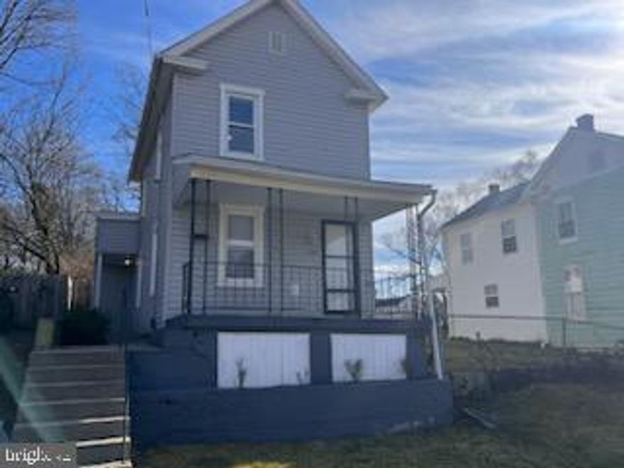 Adorable colonial with 2 bedroom and 1 bath across the street from brand new homes.  This home has a bunch of new updates.  New floors, new lighting, new refrigerator, and the hvac is only a couple years young.  Great off street parking,  paver patio, fenced in yard,  room to build a garage or out building with rear alley access.  Amazing potential!!