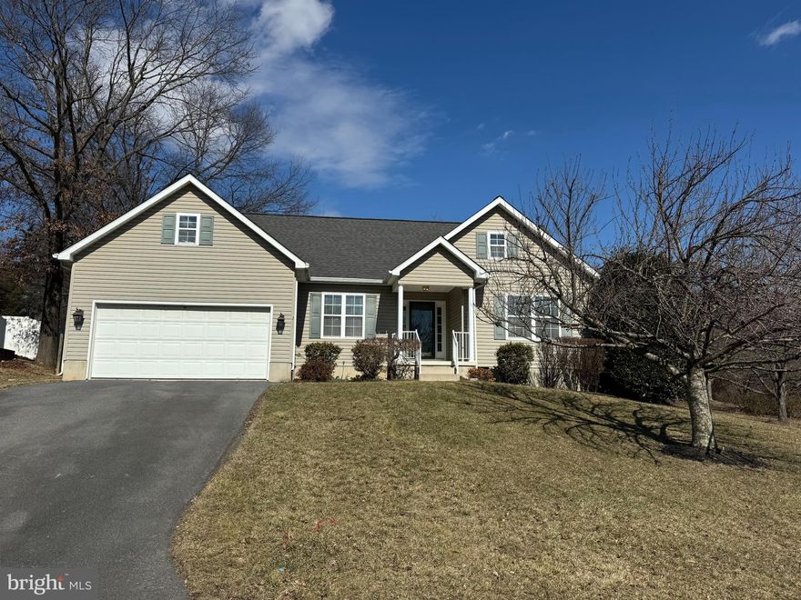 Chapel Hill is located off of 522 South of Winchester allowing access to shops, restaurants, and commuter routes.. The home offers 3 large bedrooms and 2 1/2 baths with hardwood flooring in the main living area, and a gas fireplace.  The large deck is directly off of the main living spaces and over looks a beautiful yard
with views of the pond.