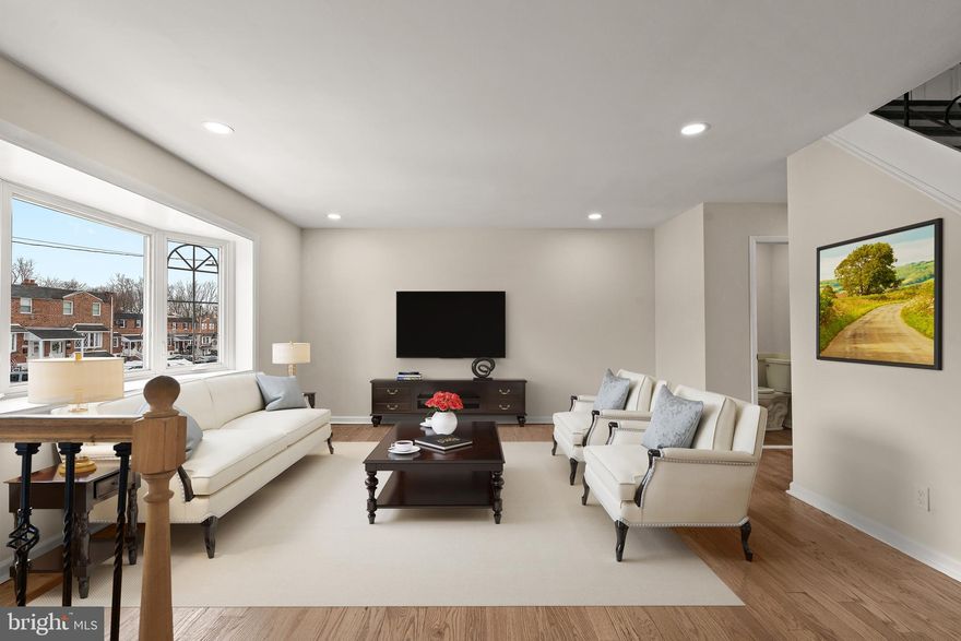 Welcome to your dream home! This beautifully renovated residence features three spacious bedrooms and one full bathroom, two half-baths, and stunning brand-new hardwood floors throughout. The inviting basement boasts a cozy fireplace, perfect for gathering on chilly evenings, while a private door leads you to your serene backyard oasis.

Enjoy culinary delights in the brand-new kitchen, equipped with state-of-the-art stainless steel appliances, ensuring that every meal is a pleasure.

Step outside onto the elegantly covered deck, directly accessible from the kitchen, making it ideal for entertaining or enjoying a quiet morning coffee. Additional features include off-street parking, providing convenience and ease in your daily routine.

Don't miss out on this exceptional opportunity to own a turn-key property that perfectly balances style and comfort!