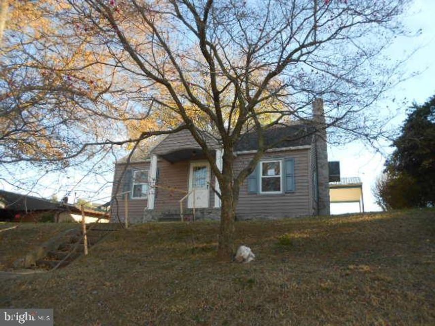 Cape Cod style home located in Eastern Schools, boasting 3 Bedrooms, 1 Full bath, C/A, lower level has bath rough in.  32x30 Pole building w/16 foot car port, rough in for bath, and is hooked to water and sewer.  These are only a few of the things offered with this home.