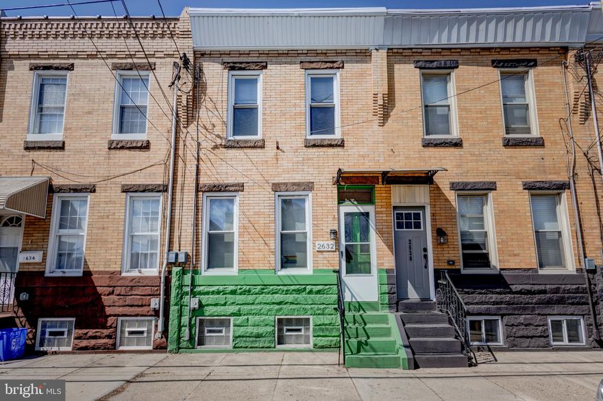 Charming 3 bed/1 bath home in desirable Port Richmond!  Enter through the foyer into a spacious living/dining room with high ceilings and hardwood floors.  The updated kitchen has stainless steel appliances and lovely wood cabinetry.  Outside you'll find a spacious patio with plenty of room for grilling and gardening.  There are three bedrooms and a renovated full bathroom with stall shower on the second floor.  The basement has a full washer/dryer and lots of extra storage.  A mini split keeps the downstairs nice and cool, and there are two more upstairs.  This is a light-filled, lovingly maintained home that is move-in ready.  With a WalkScore of 91 this home is in a great location close to shops, parks, public transportation and major highways.  Pack your bags!