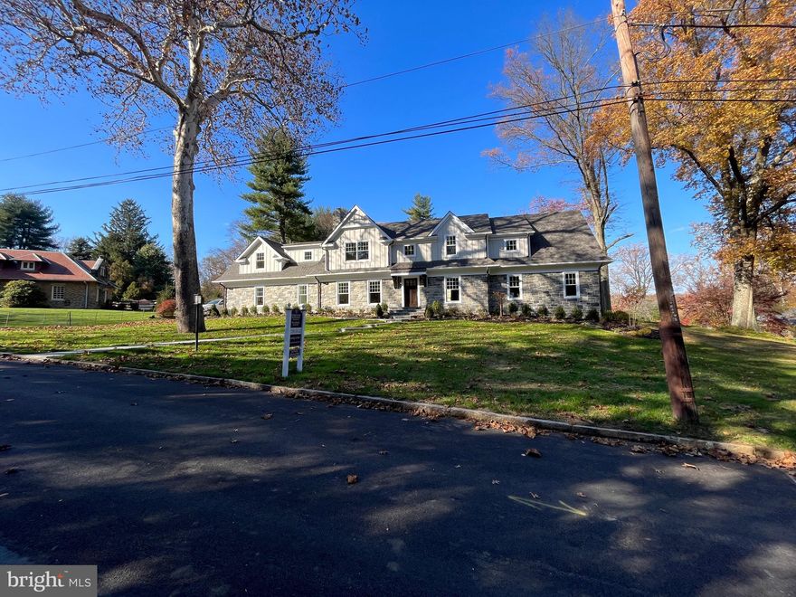 A complete Reno - this home represents both custom craftmanship and styling and resides in one of the most desirable neighborhoods of Radnor.  Located on a quiet dead end street in the Saint Davids neighborhood off Chamounix Road  is walkable to both the R5 station and downtown Wayne. The welcoming front flagstone walkway brings you to the the entrance of this stone and batten  home which was a complete rebuild from ground up creating 9' ceilings on first level and an entirely new second level. All new HVAC, roof, new hardwood floors thru out, finished basement amongst many other items allows you immediate enjoyment. The first level includes large mud room with powder room and entry to back flagstone patio with fenced yard with enough space to add a detached garage or pool.  The large gourmet custom cabinet  kitchen includes an expansive quartzite  island that seats 5+ and an eating area with fireplace and beverage bar.  Past the staircase is a large family room with a commanding limestone surround fireplace, adjacent office with bar and also a surprise second  office/or first floor bedroom with a full bath with walk in shower.  There is an open staircase to the finished lower level. The second floor houses generous storage/out of season closets, 2 bedrooms with walk in closets and  a hall bath,  a 3 bedroom with ensuite bathroom which includes a walk in shower. As you walk past the staircase you find  the laundry room,  and then an office / sitting room next to the master bedroom. The master suite has an oversized  spa like bathroom for relaxation and walk in master closet with built ins. Award-Winning Radnor Township Schools and walkable to downtown Wayne and Saint David's R5 station so easy access to Philadelphia, New York or Harrisburg.