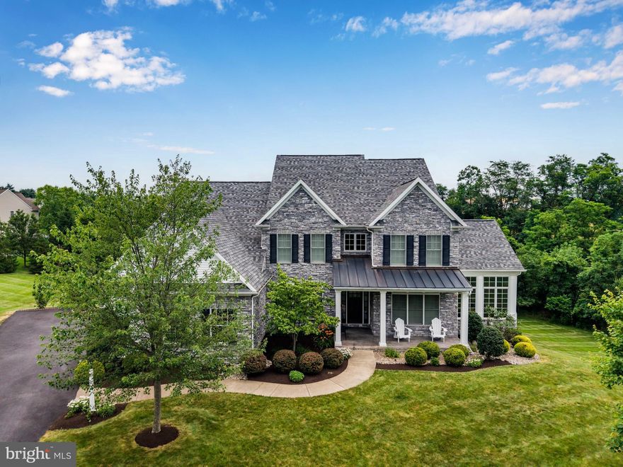 Welcome to 2365 Woodstream Way, nestled in the prestigious Preserve community of Hampden Township!This stunning residence sits at the end of a quiet cul-de-sac, surrounded by mature trees and lush common space—offering privacy, tranquility, and the perfect backdrop for everyday living.Step inside to find a spacious executive office with French doors and a formal dining room ideal for entertaining. The light-filled conservatory, wrapped in floor-to-ceiling windows, invites you to unwind while overlooking the serene yard.The gourmet kitchen is a chef’s dream, featuring a center island with seating, stainless steel appliances, eat-in dining area, and a cozy sitting nook—perfect for conversation during meal prep. The family room is anchored by a fireplace and custom built-ins, creating a warm and inviting atmosphere.Enjoy the convenience of a first-floor primary suite complete with bamboo plank flooring, a private sitting area, expansive closet space, and a spa-like bath with a walk-in tiled shower and soaking tub.Upstairs, you’ll find a private bedroom with en-suite bath, two additional bedrooms connected by a Jack and Jill bath, and an oversized loft—ideal for a playroom, study space, or media lounge.The finished lower level is an entertainer’s paradise with a half bath (including rough-in to make it a full), kitchenette, built-in daybed area under a picture window, and ample storage space.Step outside to your personal backyard retreat featuring a deck, paver patio, and a heated in-ground pool—perfect for summer entertaining and relaxing in style.Located in the highly sought-after Cumberland Valley School District, this home truly has it all—luxury, comfort, space, and a prime location.