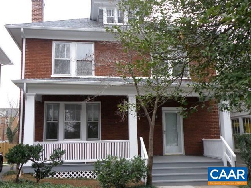 Beautifully restored 'turn of the last century' brick home, 2 blocks from the Downtown Mall. Fabulous, refinished wood floors on both levels. Elegant entry hall and expansive front porch. Large rooms (including 3 BRs; 2.5 Baths) and 10' ceilings. Yard maintenance included. Full, mostly finished basement.  Wonderful find in town. Pet considered.  All Appliances included.  N/S