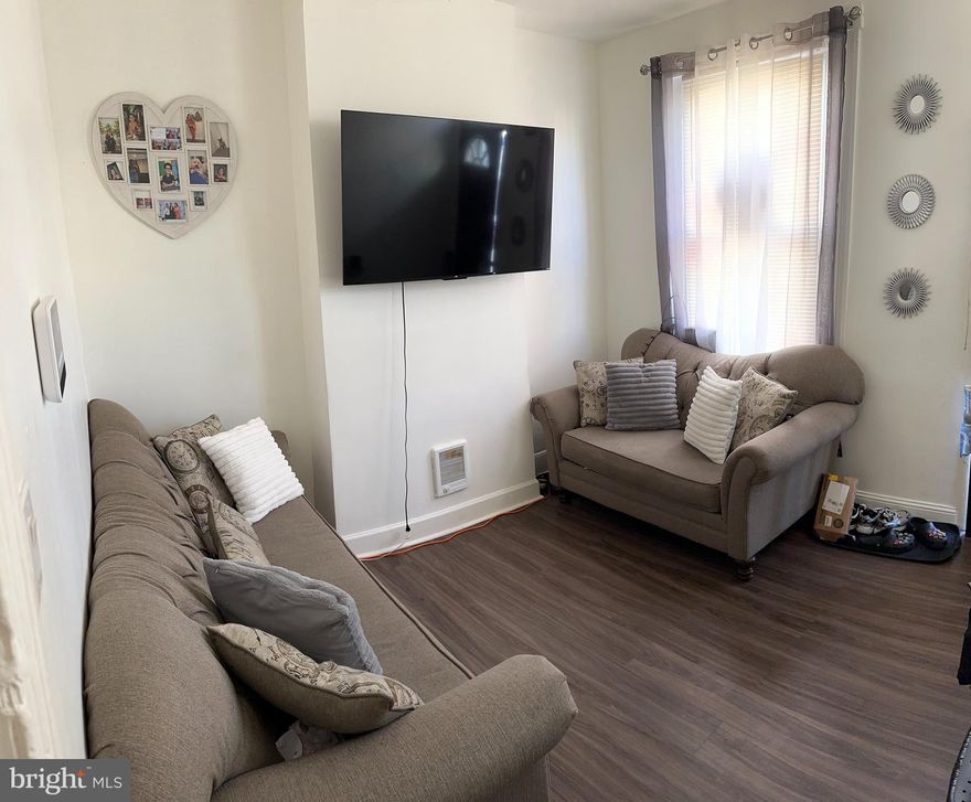 FREE 1 YEAR HOME WARRANT INCLUDED for added peace of mind to the buyer.

Welcome to this charming and affordable 2-bedroom home featuring updated flooring and a refreshed kitchen, offering a perfect blend of comfort and convenience. The basement was recently parged and cemented, creating a clean, semi-finished space ideal for additional living area, storage, or a home gym. Enjoy a fully fenced-in backyard that’s completely cemented, perfect for outdoor entertaining with low maintenance.

Whether you’re a first-time homebuyer looking to start building equity or an investor seeking a turnkey rental, this property is an excellent opportunity. The home is currently occupied by long-term tenants on a month-to-month lease, generating $1,000/month in rental income—providing immediate cash flow potential. Tenants are also willing to vacate prior to settlement should the buyer want to reside in the property.

Conveniently located near major highways, public transportation, and local amenities, this home offers easy access to everything Philadelphia has to offer.

Don’t miss your chance to own a move-in ready home or a solid addition to your investment portfolio!