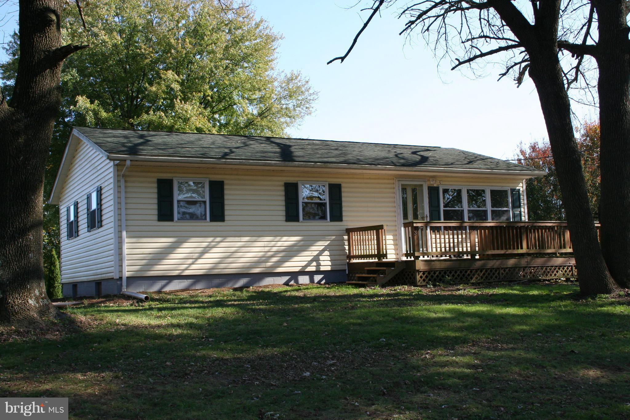 Comfortable rancher that has been freshly painted. Three full bedrooms, hardwood floors, large living room, hand made kitchen cabinets and counters. Full unfinished basement. Large yard on a dead end street and two sheds.