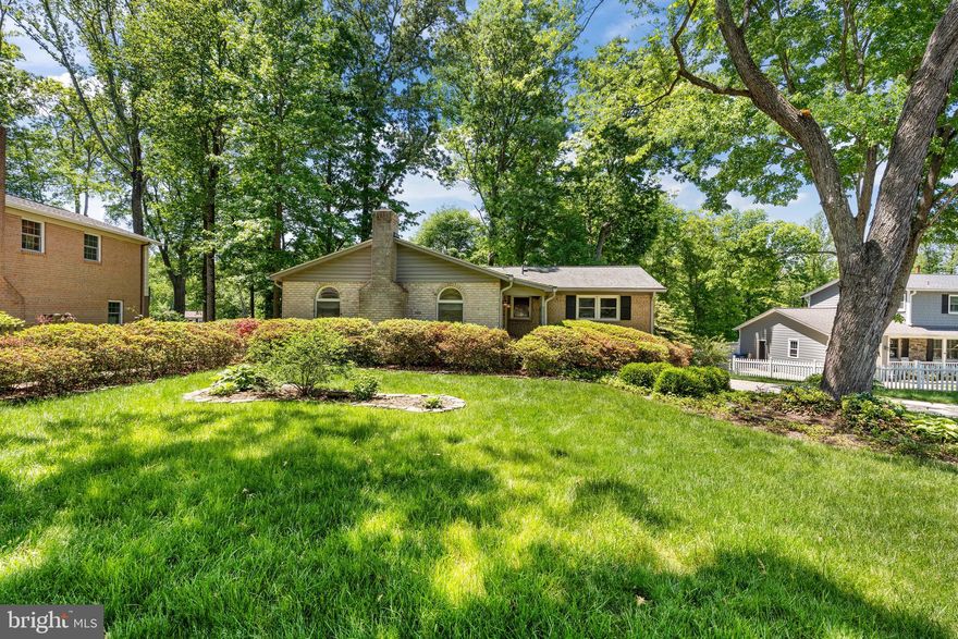Welcome to this beautifully maintained and thoughtfully updated home, ideally situated on a quiet cul-de-sac, where a charming brick walkway and mature landscaping set the tone for what’s inside. Step into a light-filled entry featuring skylights and classic brick flooring, anchored by a striking wood-burning fireplace, creating a warm and memorable first impression.
The open kitchen is designed for both everyday living and entertaining, showcasing Craftsman-style maple cabinetry, stainless steel appliances, granite countertops, and pocket doors leading to the dining room. A spacious gathering area with custom built-ins adds both function and charm.
The home offers 4 bedrooms (3 upstairs, 1 on the lower level) and 3 full bathrooms, including a fully renovated hall bath (2023). Hardwood floors run throughout the main-level family room, dining room, and bedrooms.
The finished lower level provides exceptional flexibility, featuring a full bedroom and full bathroom, a large sitting area with a second wood-burning fireplace, and a dedicated office space—perfect for guests, multi-generational living, or working from home. The space is complete with brand new carpeting, fresh paint and crown molding for a polished feel.
Step outside to a private backyard retreat, complete with a patio—perfect for relaxing or entertaining—surrounded by mature landscaping for added privacy.
Major updates include a water heater (2023), HVAC (2015), carpet (2026), new paint and roof (approx. 10 years old). Additional highlights include updated windows and timeless finishes throughout, offering a perfect blend of comfort, character, and functionality.