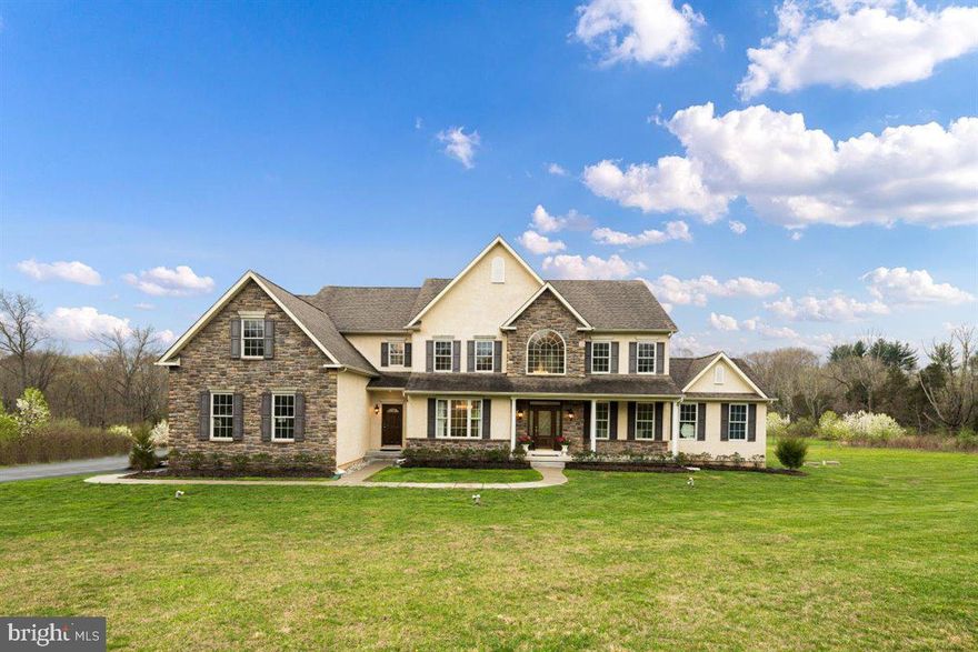 Classic design combines with modern luxury in this spectacular custom house built in 2014 located in sought after Upper Makefield/Wrightstown. Situated on 10 private park like acres, every aspect of this home has been thoughtfully designed with the highest quality finish materials. As you enter this exquisite home you are greeted by a two-story foyer which features a stunning staircase that sets the tone of luxurious lifestyle living. Formal living room with hardwood floors, enter the formal dining room with coffered ceilings, wainscoting trim and butler's pantry. The open concept kitchen includes wall of windows above the sink, custom wood cabinetry, large island, Wolfe six burner range/double ovens, granite countertops, designer tiled backsplash which is a chef’s dream. Bright light and airy is the breakfast room with a tile flooring that leads to the grand two-story gathering room custom moldings, gas burning fireplace with marble facing, and recess lighting making it a great space for entertaining. The sunroom with abundant daylight and views of the backyard is perfect space for entertaining overflow. Private study off the main living area is ideal for a home office. The second front door opens to a mudroom with a large pantry. Upstairs the master suite is completed with coffered ceiling, two large walk-in closets with custom shelving and a lavishly appointed bathroom with a freestanding tub, oversized tiled shower, his and her vanities with granite tops, and large sitting room that is a superb place to unwind. One en-suite bedroom and two additional bedrooms and bathroom complete the second floor. Lower level daylight basement with walkout stairs, plenty of storage, extra high ceiling height that is a great opportunity to be finished. Your ultra-private backyard OASIS awaits!! Complete with a saltwater heated in-ground pool, hot tub, fire-pit, with large patio. Additional amenities include energy efficient geo-thermal heating and cool system, New hot water heater, 3 car garage, Brazilian cherry hardwood flooring,  The scenic view, lush lawn and private setting make this house truly a spectacular place to call home. Low Taxes, This home is in ACT 319. Conveniently located to schools, shopping, Philadelphia, Princeton, NYC, New Hope, train stations, airports and major highways. Award winning Council Rock School District, come discover beautiful Bucks County with all its beauty and excellent location!!
