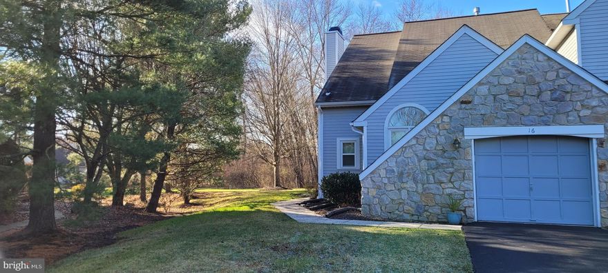 Welcome to Gwyn Ayre, a popular contemporary town home community in the heart of Lower Gwynedd.  This end unit offers a great location and lots of space with two bedrooms, an office loft, and two and a half baths plus full basement and one car garage.  Enter the side entrance into a welcoming foyer with a double coat closet.  The large bright living room  features gleaming hardwood floors, a wood burning fireplace with corner windows on either side, an exit onto the sunny deck and a soaring ceiling line that is highlighted with an open second floor walkway.   The kitchen offers  Bosch appliances including a five burner gas range, dishwasher and refrigerator plus a corner sink flanked by two bright windows with views of the yard.  A table for four fits perfectly off to the side and within a few steps of the exit to the attached garage for convenient access with your parcels.   The primary bedroom is set off to the back of this home on the first level and features hardwood floors, a large walk in closet, linen closet and sliders to the back deck.  The large primary bathroom is tiled  and offers a soaking tub (jets are not working), double vanity, large walk-in shower and a skylight which fills this room with light.  Back in the hall you'll find a guest half bath and a laundry room .  The first floor is all done in hardwood flooring.  The second level offers a loft room suitable for home office or play room, and a large second bedroom with walk in closet, plus a double closet.  The private, en suite full bath has a shower over tub.  The basement is full and unfinished.   This home is perfectly situated at the end of a cul-de-sac with views of common space offering privacy as you enjoy the large deck during the spring months ahead.  Convenient to major highways, shopping and the excellent Wissahickon School District, you'll appreciate this very special community.