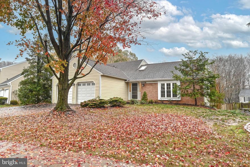 Beautifully updated  4 bedroom 3.5 Bath  2 car garage home is nestled in a quiet neighborhood, yet close to shopping, restaurants, schools and major highways. Enter your new home through an inviting foyer that opens up into the spacious living room and dining room. Enjoy preparing meals in your updated kitchen with granite counters , tile backsplash and stainless steel appliances that boasts a pass through to a cozy family room with a brick fireplace.  The cozy family room  off of the kitchen leads to an enormous deck, perfect for entertaining.  On the main level you will find the master bedroom and updated master bathroom in addition to two generously sized secondary bedrooms and an updated hall bathroom. Upper level hosts a 4th bedroom and full bathroom. Walk out Lower Level completes the home with a huge recreation room, half bath, den/storage room, workshop, and laundry room. Light and bright sunroom is located off of the recreation room and walks out to the fenced rear yard. Solar system is as-is.  Move in ready with fresh paint, new carpet and new LVT flooring throughout most of the home. Don't wait, Hurry home for the Holidays!