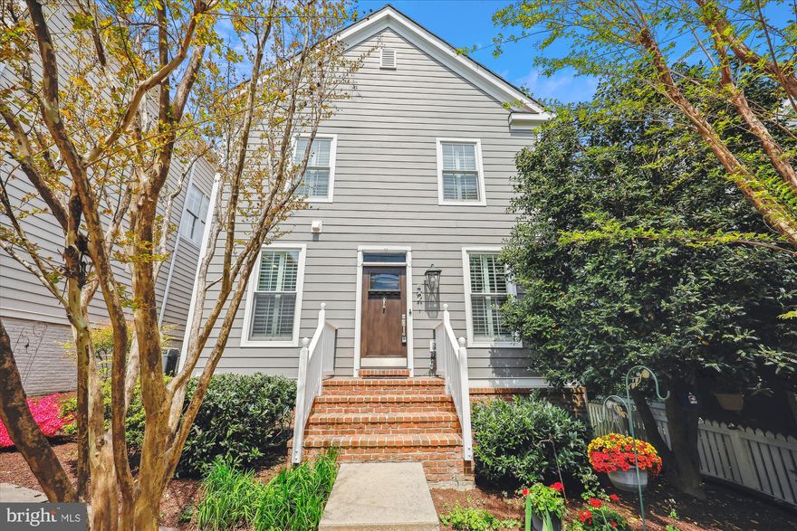 Beautifully renovated Kentlands cottage with an open floor plan and special features in every room! The spacious living room and generous dining room are highlighted by crown molding and beautifully refinished hardwood floors. The renovated kitchen features granite countertops, custom white cabinetry, stainless steel appliances—including a brand-new stove—designer lighting and fixtures, and a butler’s pantry with additional cabinet and counter space. The kitchen opens to the family room, which features hardwood flooring and wood-burning fireplace. An updated powder room completes the main level. Upstairs, the luxury primary suite boasts cathedral ceilings, hardwood floors, a walk-in closet, and a gorgeous en-suite spa bath with granite countertops, a custom vanity, soaking tub, glass-enclosed shower, and custom built-ins. This level also offers two additional generously sized bedrooms with double-door closets and a second full bathroom. The fully finished lower level features updated flooring, recessed lighting, a versatile recreation room, and a third full bath. The outside of this sensational property offers additional living space in which to relax and entertain, including a lovely brick patio leading to the detached garage and private driveway. Additional highlights include a new HVAC (2020) and water heater (2020), new siding and window casings, and custom shutters. Just moments away from Rachel Carson Elementary School and all of the countless shopping, dining, and entertainment options this award-winning neighborhood has to offer, this home is perfection!