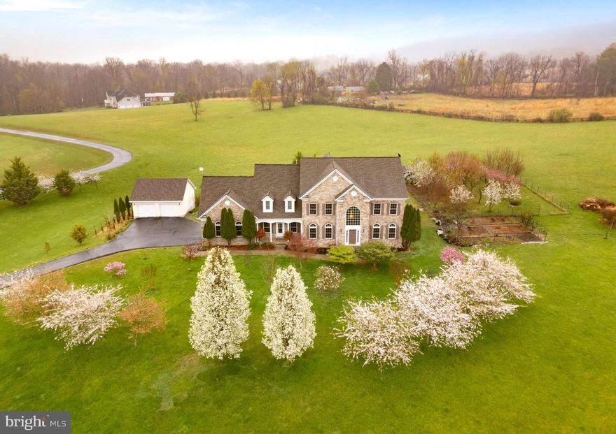 Calling all hobby farm and wine enthusiasts—this is the one. Set on 10 scenic acres surrounded by rolling hills and vineyards, Heskett Lane offers the perfect balance of peaceful retreat and hands-on living.

A mature fruit orchard, vegetable garden, goose pen (yes—Mrs. Goose conveys and lays eggs in the spring), and a 5-car garage create endless opportunities to garden, gather, and grow. When it’s time to unwind, take a short stroll to Loco Lion Brewery or explore seven nearby wineries—all within five miles. (Uber encouraged.)

Inside, over 6,000 square feet have been thoughtfully updated to blend comfort and scale. A grand foyer with a curved staircase sets the tone, leading into expansive living spaces designed for entertaining. The oversized kitchen flows seamlessly into the family room, creating a true heart-of-the-home feel.

A rare main-level bedroom and full bath—plus nearby laundry—offer flexibility for guests or long-term living. Upstairs, the private primary suite is a retreat of its own, featuring three large closets, a gas fireplace, en-suite bath, and sweeping backyard views. Three additional bedrooms and two baths complete the upper level.

The finished lower level adds even more versatility, with a game area, two dens, a living space, full bath, sixth bedroom, and a sauna with red-light therapy.

Major updates include a detached 2-car garage (2013), paved driveway (2014), roof (2017), lower-level HVAC (2022), furnace (2023), and upper-level HVAC (2024). Professional photos and floor plan coming soon.