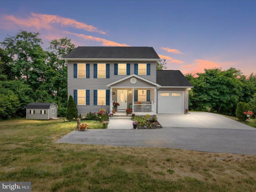 Nestled on a spacious corner lot on a private street, this stunning home offers a perfect blend of elegance and comfort. As you step inside, you'll be greeted by the warmth of the beautiful hardwood floors and an airy, open layout that beckons you to relax and unwind. The large country kitchen is a home chef's dream, featuring granite countertops and a brand new custom tile backsplash that adds a touch of sophistication to the space. Entertain with ease in the dining area, which leads to the deck installed in 2020, perfect for outdoor gatherings and enjoying the serene surroundings.  The first-floor half bath was tastefully remodeled in 2022, boasting a new tile floor, vanity, lighting, shiplap, and mirror. Throughout the home, new lighting fixtures illuminate every room, creating a welcoming ambiance. Upstairs, brand new laminate flooring graces the bedrooms and hallway, while new carpet on the stairs adds comfort and style. The hallway bath has been updated with new tile flooring, fixtures, vanity, and fresh paint, offering a modern and luxurious feel. The primary bedroom exudes luxury with a tray ceiling, and the primary bath dazzles with brand new custom tile flooring, fixtures, and paint. The large, finished basement has been recently painted and features new LVP flooring, providing a versatile space for relaxation or entertainment. Guests will feel right at home in the fourth bedroom and full bath located off the finished basement. Outside, the home boasts a generous yard adorned with lush landscaping, beautiful trees and a newer shed for added storage.  Ample parking with a driveway that can accommodate 2 cars plus a deep garage.  Don't miss the opportunity to make this exceptional property your own.  With no HOA fees, and ideally located near the MARC Train, Library, and the picturesque C&O Canal.  Experience the epitome of modern living in this meticulously upgraded colonial home. Schedule a showing today and discover the beauty and comfort this home has to offer.