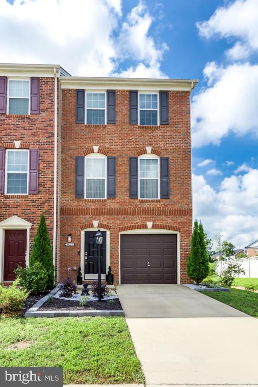 Gorgeous 3 level End Unit Townhome. Why wait for new construction when you can move right into this beautiful brick front home only five years young? Inviting entrance with landscaped walkway leading to the front door. Lower level has a family room/rec room, half bath, laundry area and entrance to the one-car garage. There is also a door leading to the back yard which is partially fenced in with a patio, making it the perfect spot for entertaining.  Main level has an eat in kitchen with granite countertops, island, tile back splash, stainless steel appliances including a gas range/oven and built in microwave and a second family room. Bedrooms are located on the upper level. Master bedroom has a walk-in closet, master bath with tiled wall shower/tub combo and dual vanity sinks. Second bedroom with large closet and bath with tiled wall shower/tub combo. Enjoy all the amenities of Gleneagles Neighborhood including the Community Center, swimming pool, multiple playgrounds and walking paths. Also near White Plains Regional Park with an 18 hole golf course, lighted tennis courts and a dog park. Don't wait, this one will not last!