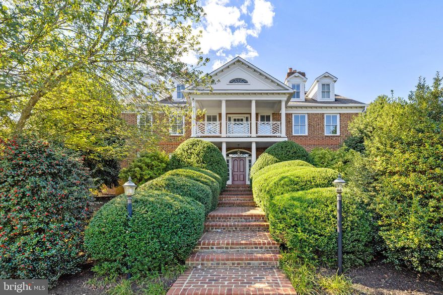 Lovely brick home on hilltop setting.  Home updated in last two years.  Wood floors, high ceilings, lots of light.  6 bedrooms, 5 1/2 baths, 5 fireplaces, kitchen updated, sweeping staircase in foyer.  Basement level finished for family enjoyment, media room, office, gym, full bar with kitchenette, full bath and outside entrance leading to pool and spa.  Improvements include 3-car garage, another 4-car heated garage, potting shed/studio with attached heated glass green house, 20 car barn for serious collector and 5 stall barn.  Property is fenced and cross fenced.  Two parcels tax Id # 6938-61-5417, 6938-50-7907.