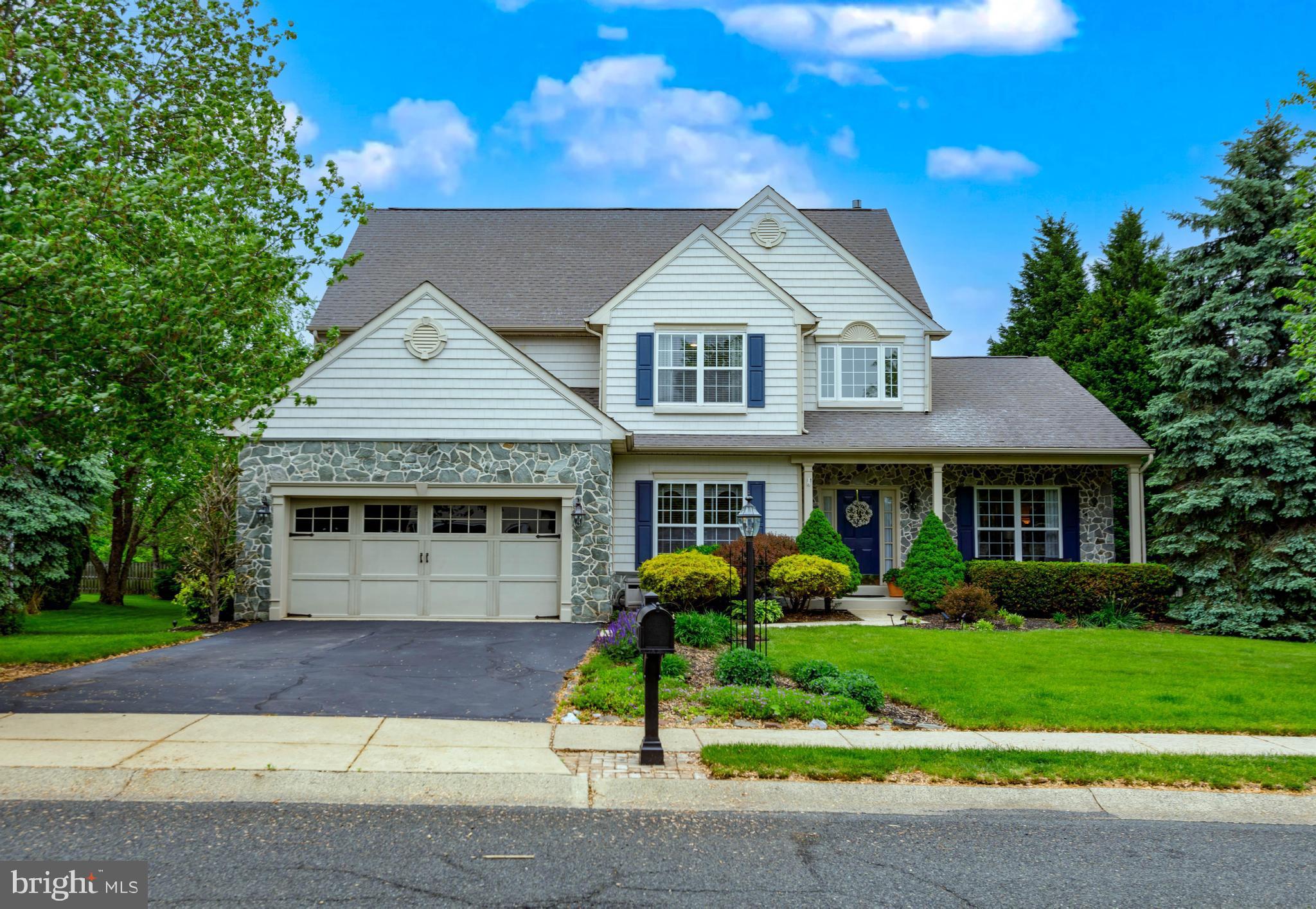 Welcome to 727 Daniel Drive, a beautifully updated 4-bedroom, 2.5-bath Colonial in the highly sought-after Cassel Mill community of Collegeville. This spacious home offers over 3,700 square feet of refined living space, showcasing thoughtful upgrades and timeless elegance throughout. The full front façade was redone in 2014 with stone and new vinyl shingle siding, creating charming curb appeal.
Inside, the grand foyer is enhanced with wainscoting that continues through the hallway and stairwell, while upgraded lighting and plumbing fixtures throughout the home provide a polished finish.
The open-concept kitchen and family room feature ¾-inch hardwood floors, granite countertops, a large butcher-block island, gas cooktop, electric double oven, and under-cabinet lighting and high capacity refrigerator freezer. A spacious dinette with a large bump-out and white cabinetry completes the heart of the home. The family room offers a cozy gas fireplace, perfect for everyday living and entertaining. Formal living and dining rooms are highlighted by elegant details including an illuminated cathedral ceiling, tray ceiling, crown molding, and custom window treatments. The oversized laundry/mudroom includes built-in cubbies, washer and dryer, and access to both the garage and exterior. Adjacent to the entry foyer, a large office/den with built-in desk and shelving sits just off the foyer—ideal for working from home.
Upstairs, the serene primary suite was renovated in 2019 and features thermal floor heating, a freestanding tub, oversized shower with Grohe rain and handheld shower-heads, Euro-style dual flush toilet, and high-end finishes throughout. Three additional bedrooms are spacious and bright, while the walk-up attic with full windows and an exhaust fan offers future expansion potential. The fully finished basement expands your living space with a large recreation or play area, dedicated workshop, ample storage, and a sump pump for peace of mind.
Outdoor living is just as impressive, with a covered front porch, professionally landscaped grounds with mature trees, and a two-level composite back deck complete with a retractable canopy, lighting, and backyard fire pit—ideal for entertaining or relaxing. Additional updates include a new HVAC system (2023), new water heater (2018), and radon remediation system. This meticulously maintained home combines comfort, style, and practicality in a prime location close to shopping, dining, and award-winning schools.