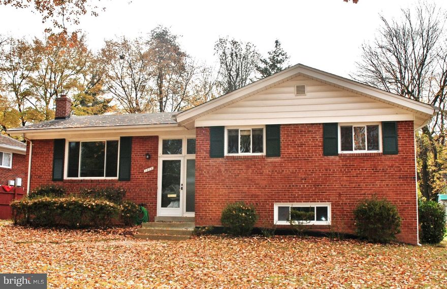 Priced to sell! Spacious, bright, inviting 4BR close to Metro & shops. Open design featuring modern kitchen, separate living & dining areas  newer windows, fresh paint, original hardwood floors, newer hot water heater, new washer, W/O basement with half bath, private driveway, new patio, plus1 year HMS warranty. A true gem that needs a little TLC to shine.