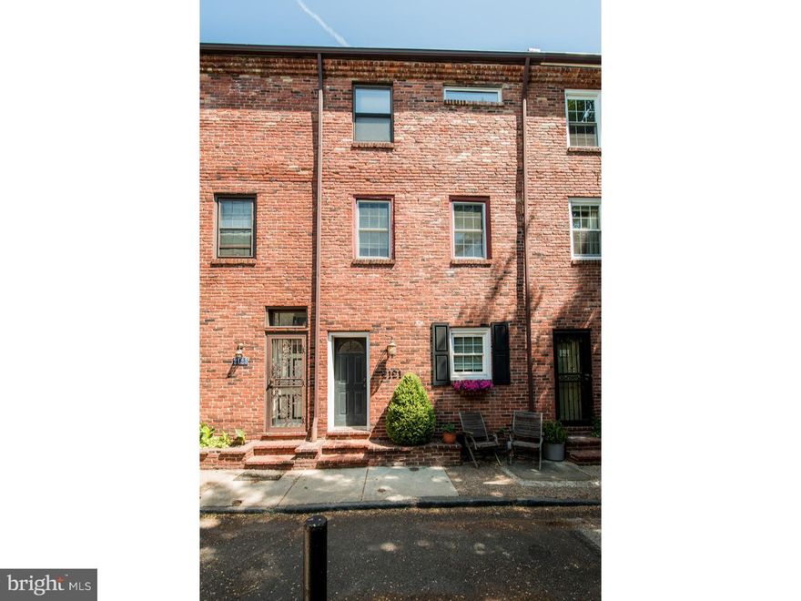 Updated 2 bed 1.5 bath home on charming Rittenhouse block.  Renovated kitchen with ample maple 42" cabinetry, Stainless appliances, soap stone counter tops, lime stone back splash, and espresso island with butcher block top. Dining area with built-in shelving, exposed brick wall, and floor-to-ceiling windows. Half bath with wainscoting walls.  2nd floor with 2nd bedroom, as well as  a spacious living room with brick wood burning fire place and expansive window covering the entire wall.  Hardwood floors, recessed lighting, amazing natural light, and central A/C throughout entire home. Generous 3rd floor master suite with exposed beams in a vaulted ceiling provides a grand, open feel.  Huge walk-in closet boasts custom floor-to-ceiling solid wood built-ins.  Bathroom with recently installed vanity and mosaic tile back splash.  Spiral stair case to roof hatch?perfect for a roof deck?with amazing skyline views (A must see when touring). Full basement provides excellent storage, a cedar closet, and washer/dryer.  Tree lined Tryon Street in the front of the home and a quiet courtyard in the rear.  Steps from Pub & Kitchen, the newest Tria, and Rittenhouse Square.  A short Stroll to PENN, CHOP, and Schuylkill River Park.  Convenient to public transportation and major highways.