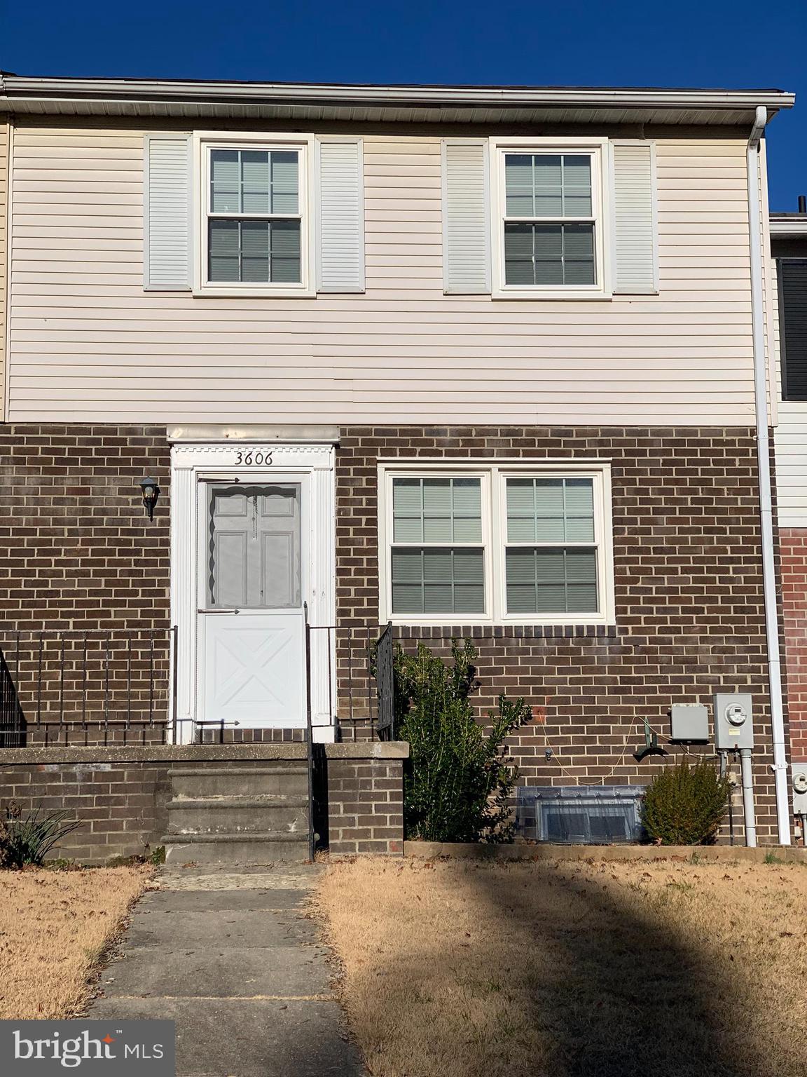 1400 SQUARE FEET OF LIVING SPACE ON THE UPPER TWO FLOORS * DECK*PLUS 400 SQUARE FEET OF FINISHED BASEMENT WITH WALK OUT TO BRICK PATIO.