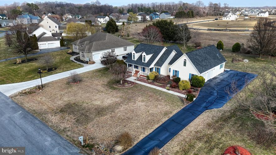 Spring has sprung this beauty and it is ready for you to move in! Don't wait for new construction this gorgeous ranch has all the bells and whistles. Pull up the drive to a beautiful landscaped entrance surrounding with lots of perennials just waiting to bloom. The porch gives that southern charm of rocking chairs and ice tea on warm summer nights. Through the front door welcomes an open floor plan with the formal dining area off to the right. Kitchen boost lots of cabinetry and center island for entertaining. Massive four seasons room with vaulted ceilings can easily have the gas reconnect if you choose.. Trex decking off the back gives way to more space to enjoy the exterior lighting in garden at night. Bedroom suite has a tranquil feeling with a jetted tub, separate shower, skylights,  slider, extended height vanity, vaulted ceilings and walk in closet all on one side of the house so you have your own  retreat.  The other side of the house  boost two nice size bedrooms with a shared full bath with extended height vanity. Laundry is also on the main floor with an additional half bath. Walk upstairs just off the garage and you will find  a whole  other living space that boost  a spacious  bedroom with full bathroom. Adjacent  are two large walk-in attic spaces for lots of storage for all those extra things. Crawl space is dry and has a french drain. Garden space in the back of the property is ready for  vegetable plants to be planted  for summer harvesting. This is a one of a kind home just minutes from shopping, Route 1 to the beaches and most everything in that Kent county has to offer. Small HOA fee annually.Septic has been certified. Waterside is a premier development so don't miss out on this one.
Owner is accepting back up offers.