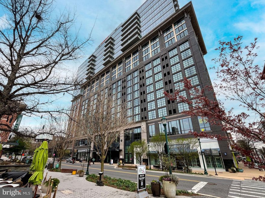 Luxury Living at Pike & Rose! Welcome to Unit 1701 at 930 Rose Avenue, a stunning 2-bedroom, 2-bathroom corner residence in the heart of North Bethesda. This modern high-rise condo boasts floor-to-ceiling windows that flood the space in natural light while offering breathtaking city views.

The open-concept design features wide-plank hardwood flooring and a chef’s kitchen complete with a cascading quartz island with bar seating and sleek stainless steel appliances, perfect for cooking and entertaining.

The primary suite offers a spa-like bathroom with dual sinks and a generous walk-in closet, while the second bedroom provides flexibility for guests or a home office. Additional highlights include an in-unit washer and dryer for ultimate convenience. This unit also has a storage unit in basement and one assigned parking space in parking garage. 

Enjoy top-tier amenities, including a rooftop lounge, fitness center, and 24-hour concierge. Just steps from dining, shopping, and entertainment at Pike & Rose and minutes from Metro, this is urban living at its finest. Don’t miss this rare opportunity!