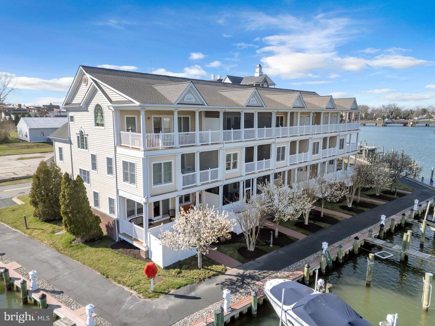 Waterfront Living – 202 Muir St, Cambridge, MD

Welcome to 202 Muir Street—a rare and undervalued waterfront gem nestled on the serene shores of Cambridge Creek. This spacious, townhome-style condominium offers over 3,800 sq ft of luxury living and includes deeded boat slip #6, making it a true haven for boaters, investors, and second-home seekers alike.

Enjoy breathtaking panoramic views of Cambridge Creek and Bluewater Marina from nearly every room. Wake up to sunrise views, launch a kayak or paddleboard from your powered dock, fish from the edge of your private slip, or simply relax and take in the activity on the water. Personal watercrafts welcome—this is the ultimate entertainer’s waterfront retreat.

Inside, a chef’s kitchen awaits with granite countertops, stainless steel appliances, recessed lighting, and picture-perfect water views. Rich hardwood floors flow throughout, adding warmth and elegance to the home’s open layout.

Each level features expansive screened-in decks, ideal for al fresco dining or quiet relaxation. The waterside primary suite is a private sanctuary with deck access, hardwood floors, a generous walk-in closet, and a spa-inspired ensuite bath with a tiled walk-in shower and double vanity.

With three additional bedrooms, a beautifully appointed guest bathroom, a two-car garage, and low-maintenance composite decking, this turnkey property delivers comfort, convenience, and flexibility.

Whether you're seeking a peaceful waterfront residence, a high-yield investment, or a weekend escape, 202 Muir St checks all the boxes—with deeded boat slip #6 adding unmatched value and lifestyle appeal.

Schedule your private tour today and discover the unparalleled charm and opportunity of this one-of-a-kind waterfront property.

Square footage is approximate and should not be used for property valuation