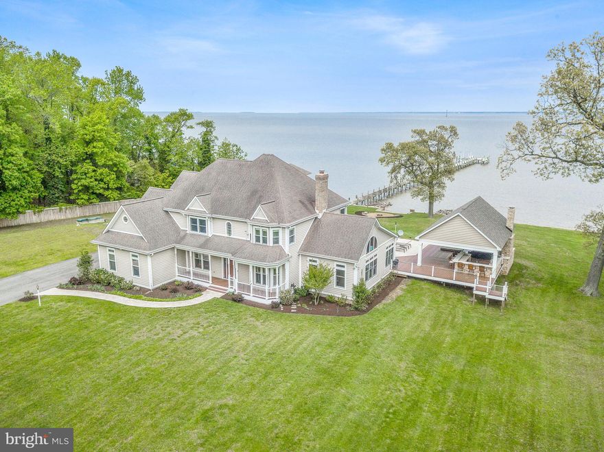 Gorgeous five acre equestrian waterfront estate with panoramic views of the Chesapeake Bay.  In addition to the stunning remodeled 5600 sq. ft home (tax record incorrect) this property includes bulkhead, pier, private beach, in-ground pool, pool house, new large pavilion with outdoor kitchen, stacked stone fireplace and 6 person hot tub.  There is also a private guest house, horse barn/stable, shed/workshop, whole house generator and newly built natural stone fire pit.  It's your own very private retreat for fishing, boating, crabbing, entertaining all in a breathtaking waterfront setting.