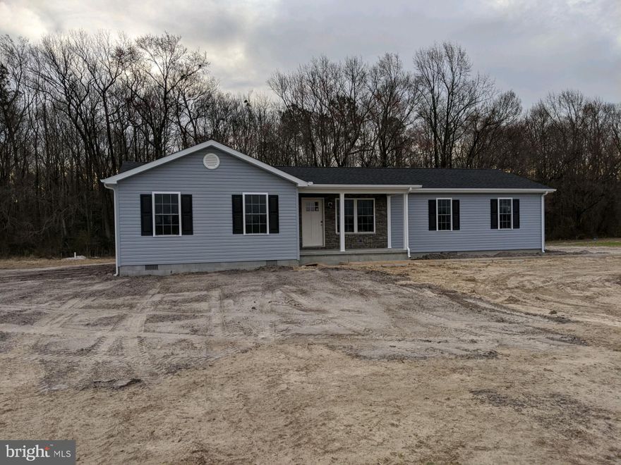 Looking for a GORGEOUS home on a large 2 acre lot in desirable Willards......here you go!!! This home has been FULLY renovated from rafters to floor joists. This home features a gorgeous open floor plan with granite counters in the kitchen w soft close cabinets. ALL new wiring, appliances, central HVAC, roof AND septic!!! Sit back an relax on the front porch w beautiful stacked stone front while watching the deer frolic in the field across the street :) The backyard is open and spacious for entertaining the family. You do not want to miss this home!!!!