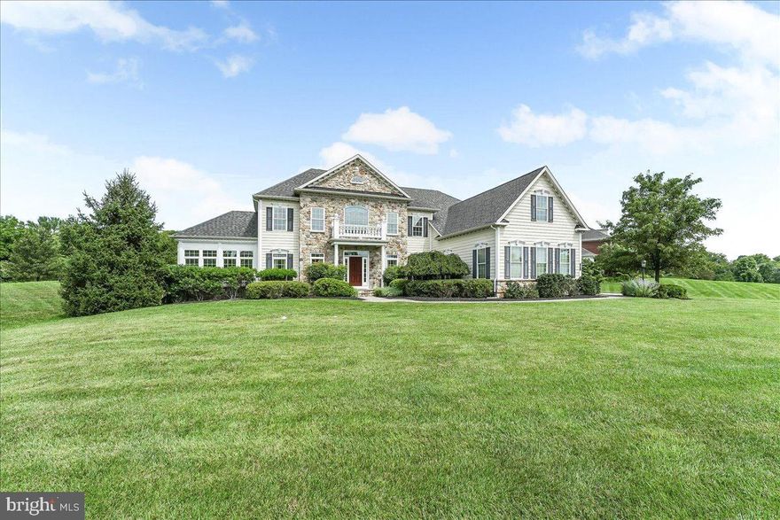 Welcome to 2 Scaleby Lane - an exceptional estate home nestled in the prestigious Scaleby Farm community in scenic Pocopson Township. Set on over 2 pristine acres, this meticulously maintained colonial-style Model Home blends refined architectural details with luxurious modern upgrades, offering the best of Chester County living.
From the moment you arrive, you'll be captivated by the stately stone façade, elegant portico entry, and manicured landscaping. Inside, over 7,300 square feet of beautifully finished living space awaits. The grand foyer leads into formal living and dining rooms with hardwood floors, crown molding, and abundant natural light.
The heart of the home is a gourmet kitchen featuring granite countertops, a center island, Viking stainless steel appliances, large pantry, a butler’s pantry, and a sun-soaked breakfast area. The adjacent family room with vaulted ceilings and custom built-ins is perfect for entertaining or relaxing by the fireplace, listening to the whole-house surround system. 
Upstairs, the luxurious primary suite is a private sanctuary with a sitting area, balcony, grand walk-in closet, and a spa-inspired bath with granite vanities, jetted tub, and walk-in shower. Three additional spacious bedrooms each have walk-in closets and en-suite full baths.
The finished walkout basement expands your living and entertaining options with a wine cellar, wet bar, media room, recreation space, full bedroom, and full bath. Expansive, unfinished area offers ample storage.
Additional highlights include: Main floor home office with built-ins; Sunroom with serene backyard views; Two new HVAC units (2023 and 2024); New water heater (2024); New washer and dryer (2024); Extensive hardscaping, rear patio, and balcony; Oversized 3-car garage + expansive driveway parking; Energy-efficient systems, recessed lighting, upgraded trim and finishes throughout.
Community & Lifestyle: located in the award-winning Unionville-Chadds Ford School District, Scaleby Farm offers the rare combination of tranquil suburban living and unbeatable access. Enjoy proximity to charming downtown West Chester and Kennett Square, featuring top-rated dining, boutique shopping, and community events.
Outdoor enthusiasts will love nearby trails at Stargazers Vineyard, Longwood Gardens, and Brandywine Creek State Park, while golfers can tee off at Glen Mills, Radley Run, or Kennett Square Golf & Country Club. Commuters benefit from easy access to Routes 1, 52, 202, and 322, putting Philadelphia, Wilmington, and the Main Line within reach in under 45 minutes.
If you’re seeking luxury, space, and serenity in one of Chester County’s most desirable communities, 2 Scaleby Lane is a must-see.