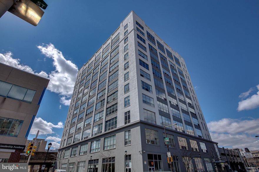 THE PENTHOUSE WILL NOT BE AVAILABLE FOR SHOWINGS UNTIL MONDAY MAY 10TH
Amazing Penthouse in the City under 1 MILL with "2" Deeded Covered Garage Parking Spaces and OUTDOOR Private Roofdeck SPACE!!2200 Arch is an award winning luxury loft development in the Heart of Logan Square. The Penthouse loft profiles as a 2 bedroom, 2 bath marble and Stone with Jacuzzi in the master bath suite, and a private roofdeck terrace offering unprecedented Westernly and Northern skyline views and Incredible sunsets. The Luxury Penthouse includes 2 DEEDED and COVERED garage parking spaces with interior access to high speed glass enclosed elevators that whisk you to your Penthouse floor while enjoying panoramic views of the city. You enter the apartment into an enormous living room that leads you into the lofted living/dining/kitchen areas featuring warehouse sized thermal windows, soaring 17' foot ceilings, and a wonderful slate ventless gas fireplace,  cherry hardwood flooring throughout, Custom Cabinetry in your Gourmet stainless steel kitchen with gas cooking. Smart-house upgrades include an Elan surround sound system and a newly installed HVAC Unit. You'll enjoy 1773 sq. ft. of living plus 600 sq. ft. of outside Private roofdeck. The building is centrally located to Philadelphia's business, commerce, cultural and restaurant districts. The lobby has been tastefully renovated, and each floor common area has been architecturally redesigned. Additional spectacular amenities of a gym, 24-hour doorperson, Arch Gourmet convenience store on the first floor all in a pet-friendly building, steps away from 30th Street Station and Trader Joe's, the Trolley, and Market Street Financial Centers. What a wonderful place to Live! BRAND NEW "GIANT "FLAG SHIP GOURMET GROCERY MALL WITH OUTSIDE SEATING!! Totally Awesome, love the selection!