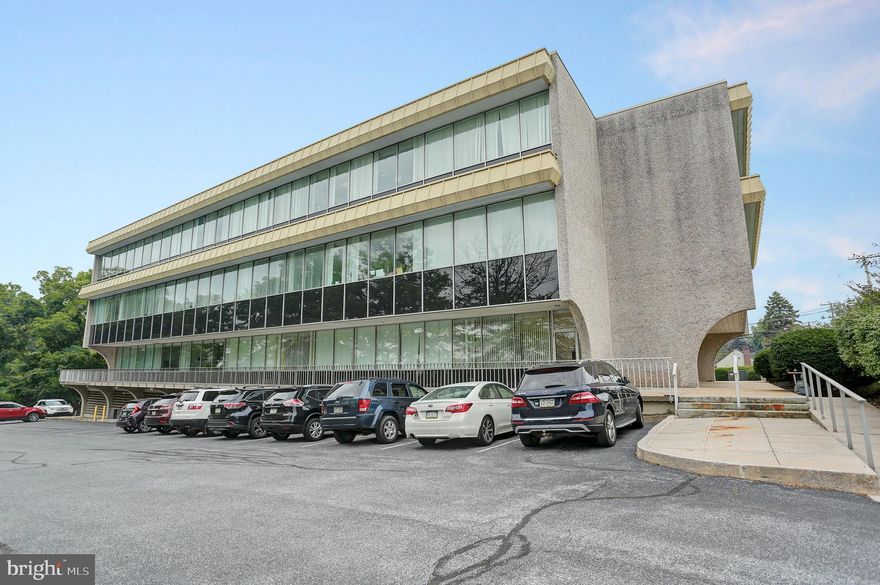 Fully leased West Shore office building in prime location close to Holy Spirit Hospital complex and just 5 minutes to downtown Harrisburg.  Several high credit tenants with long term leases in place. Structurally sound building with updated interior renovations in most suites.  Net operating income of $377,000 per year.  Tenants include medical, financial planners, law firms, and other professional office users.  Office suites range from 500 SF to 6,500 SF.   Approximately 100 parking spaces.