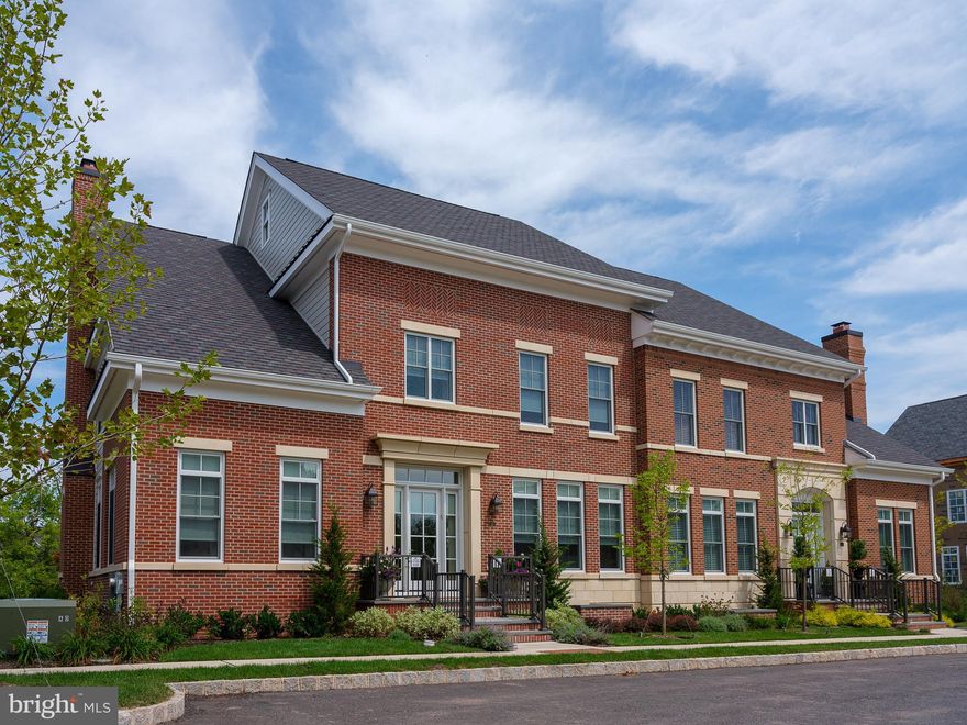 Rabbit Run Creek - where the Hampton's meet The Delaware in a private enclave of luxury and bucolic charm!  This stunning gated community is located just minutes from the center of the renowned river town of New Hope.     With over $400k of lavish upgrades, this 3B 3.5 B townhome is richly appointed with exquisite materials and finishes. As you enter through a stately over-sized front door into a bright and welcoming foyer, you will be struck by the quality and elegance of detail. Muted gray hardwood floors run throughout the spacious main level with generous 10' ceilings, giving this open floor plan a light and airy feel. To the left are stylish French doors which lead into a generously-sized room currently used as an office. To the right is a custom-built library with extensive hand-crafted millwork and cabinetry. Straight ahead, we are led to a fabulous and expansive great room. In the lounge area is a wall of more custom built-ins and a beautiful, contemporary, slightly textured stone gas fireplace. The dining area is crowned by a striking designer glass chandelier.    Do you like to cook? Great! There's a gourmet kitchen with gorgeous white Calcutta marble counters and a center island surrounded by glazed subway tile walls with corrugated glass inserts, and custom cabinetry. The Wolf range, double wall ovens, SubZero refrigerator and Asko dishwasher are the envy of any chef. And to make entertaining a breeze, the butler?s pantry provides extensive glass-fronted cabinets for your best crystal and dishware, pantry closets, a beverage sink, 28 bottle U-Line wine cooler topped with more Calcutta marble.   Just off the dining area are two French doors which lead out to a beautiful bluestone terrace with a high stone wall, affording privacy and elegance. A Lynx gas grill and refrigerator are assets within this bluestone counter making this a perfect spot for warm weather entertaining.  Walk upstairs (or take the elevator that goes to all three levels) to find a light-drenched gallery-like hallway with plenty of wall space for art and photographs.    The master bedroom is a comfortable oasis. The master bathroom has a spa-like glass-front walk-in shower with an overhead rain showerhead and a stylish Mirabelle bath tub. The closet is fully-fitted with multiple drawers, cupboards and hanging areas ready to accommodate even the most elaborate wardrobes. Two additional spacious bedrooms with lovely ensuite bathrooms complete the second floor. The lower level/basement is finished and pre-plumbed. This home is fitted with a generator and has a rear-entry two-car garage.   The Rabbit Run Creek community is centrally located to New York, Philadelphia and New Jersey. The property sits on 20 acres and features 2100 linear feet sidewalks and paths, green open spaces with ponds, fountains and pocket parks. Located just minutes from the Route 202 commuter corridor; 69 miles from the Holland and Lincoln Tunnels; 67 miles to the Verrazano Bridge; 21 miles to Princeton; and 41 miles to Philadelphia.