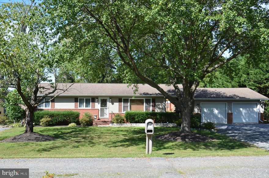 Exceptionally well-maintained rancher located on a quiet residential street (Hayward Trail) in the Doncaster community between Easton and St. Michaels. The 3-bedroom, 2-bath home features a spacious dining/family room addition w/fireplace and cathedral ceiling. A breezeway connects the house to a 2-car garage. The back yard is special, with a beautiful swimming pool and covered Tiki Bar/sitting area overlooking the pool. You have to see to appreciate! The house is connected to Breezeline high-speed internet and is currently being connected to Talbot County's public sewer system (connection fee already paid). Separate storage building and ample parking for multiple vehicles.
