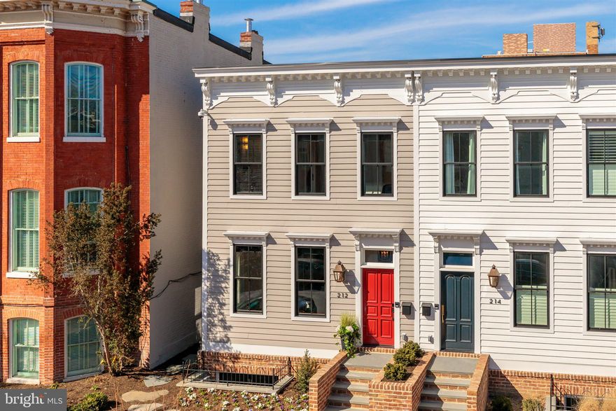 Premier location on Capitol Hill's most coveted street, just steps from the Supreme Court, Capitol and Senate Buildings. This special property originally built in 1874 was masterfully and completely renovated by Connell and Schmidt in 2019 (Main house + Carriage house).  The home offers a spectacular open floor plan, elegance and exceptional scale.  The principle structure is an impressive home with 4Bd/5.5Ba and 4,000 SF of living area.  This includes a spacious rear yard with an outdoor kitchen and gourmet grill, outdoor TV, Ipe deck with sectional and built-in seating.  Additionally, there is a private two-story carriage house that boasts a 685 SF 1Br/1Ba apartment with 572 SF of heated/cooled space equipped for two vehicles.   The entire home is integrated with the most advanced technology and security including SMART living automation: motorized Lutron blinds & curtains + smart lighting + a 16-zone home sound matrix, all controlled by an App from anywhere in the world.   The home is well-suited for large gatherings as well as for intimate ones and features thoughtfully implemented custom finishes throughout.  High ceilings, custom millwork, white oak flooring, Carrara marble, gas fireplace, finished lower level w/private entrance, southern exposure, and solar implementation make this a truly special opportunity.