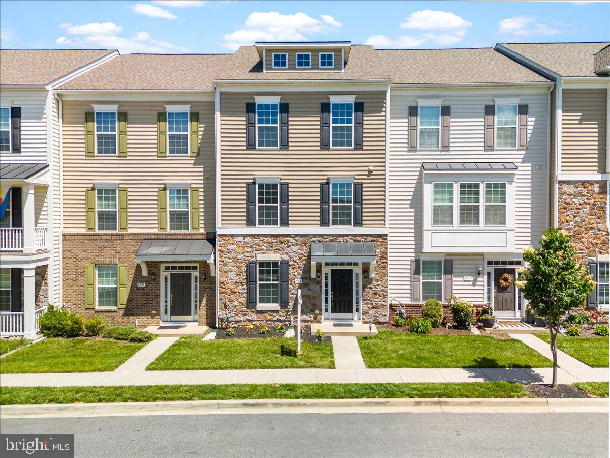 Welcome to this exceptional townhome in the desirable Market Square community at Worman's Mill. This stunning three-level residence offers the perfect blend of elegant living space and modern convenience. Throughout the first and second levels, you'll find beautiful solid hardwood floors, complemented by newly installed carpet in all bedrooms for ultimate comfort. The gourmet kitchen is truly impressive, featuring beautiful cabinetry with abundant storage, elegant granite countertops, and an expansive kitchen island with a gas stove for precise cooking. The main level opens to a thoughtfully designed living space that flows seamlessly between the kitchen, dining area, and a private deck overlooking a peaceful treeline with walking path, offering the perfect blend of convenience and natural privacy. The upper level features a stunning primary suite with generous walk-in closet and a luxurious bathroom with dual vanity, large walk-in shower with bench, and separate toilet area. Two additional bedrooms share a well-appointed full bathroom, while the convenient upper-level laundry area. The lower level provides a private fourth bedroom next to another full bathroom, and direct access to the attached 2-car garage and front door. Market Square at Worman's Mill offers exceptional community amenities, including a community park, tot lot, and swimming pool (included in HOA fees). You'll be just steps from these amenities and a mere 5-minute walk or short drive to shopping, One Life Fitness, and restaurants including Black Hog Barbecue, Madrones and many others. Market Square is minutes from downtown Frederick's shopping, restaurants, and walking and biking paths. Commuters will appreciate the convenient access to major routes (US-15, I-70, I-270) for easy travel to the Washington DC metro area, historic Gettysburg, and Catoctin Mountain Park. This townhome combines luxury and a great location in a quiet neighborhood in one of Frederick's most sought-after communities!
Application is via Rentspree https://apply.link/G6sq74I - Application fee $49.99. Rental Criteria: 620+ Credit Score, excellent rental history, Income 3x rent.
