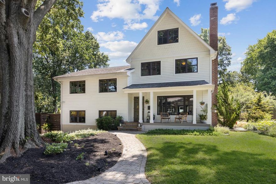 BRILLIANTLY MODIFIED SPLIT LEVEL in WATER PRIVILEGED ADMIRAL HEIGHTS! 4 FLEXIBLE & FLOWING LEVELS FOR YOU TO INHABIT!  MASTERFULLY DESIGNED DECKING, PATIOS, & CULTIVATED PERRENIAL & VEGETABLE GARDENS!  IDYLLIC SETTING mere minutes from metro amenities & Downtown Historic Annapolis. Brick steps to welcoming plantation porch complemented by artisan glass panel front door. Totally REIMAGINED BLUEPRINT with lower level Den/Family Room offering custom built-ins & gas fireplace, Half Bath, & large walk-in pantry.  Main level open concept Living Room with wood burning fireplace sharing ambiance w/exposed beam granite & stainless Kitchen!  Dining options include a formal Dining Room, bistro Kitchen dining, screened porch crab feasts, patio picnics, and fire pit marshmallow roasts!  Gaze over the professionally landscaped/ hardscaped yard, made vivid by bursts of color & exterior accent lighting!  2nd Level includes a Hall Bath, 2 BRs,  then step-up to 3rd level featuring a Bedroom and Primary Bedroom Suite w/porch overlooking backyard & spa Bath!  A BONUS 4TH LEVEL boasts even more living flexibility with another 2 BRs (Studio? Home Office?), home gym area, and another FULL Bath.  Ideal location just minutes from the community pool, community waterfront parks, the Navy Stadium, West Annapolis’ artsy shops & restaurants, downtown City Dock, and commuter RTs 50/2/97.  There is no formal HOA, but Admiral Heights offers a voluntary community improvement organization that residents can join @ $50/year.  EXPAND & EXHALE!