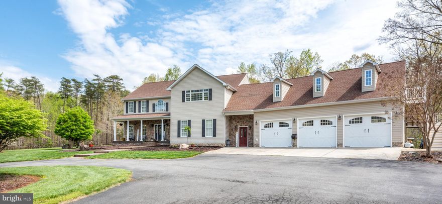 This Gorgeous, spacious Colonial sits  back on a wooded/cleared lot with a paved driveway that winds up to the house.  Beautifully updated with a three car garage that has unfinished space above the garage which could be converted to  additional living space.  Original two car garage was converted into living space, which increased the original square footage by approximately 500 square feet.  This space lends itself to the perfect home office that is big enough for the whole family or for operating your business from home!   So many recent updates to this home include some new kitchen cabinets, all new appliances and complete makeover of the Master Bath, Guest and Basement bathrooms.  All flooring has been been updated to hardwood and Luxury Vinyl Tiles, including the bathrooms.  Enjoy all of the privacy and natural beauty of this lot on the new stamped concrete patio, front porch and sidewalks.  Basement updates include new flooring and barndoor.  So much space and so many possibilities.  Updates to HVAC in the last 5 years.   PLEASE NOTE:  EXTERIOR RAILINGS TO BASEMENT TO BE INSTALLED.  PLEASE USE CAUTION WHEN VIEWING BACK YARD, ESPECIALLY WITH CHILDREN.  SELLER HAS ALSO ORDERED REPLACEMENT WINDOWS FOR ANY WINDOWS WITH BROKEN SEALS.    SPECIAL NOTATIONS ABOUT THIS PROPERTY.  THIS PROPERTY OFFERS THE UNIQUE SITUATION  FOR THE HOMEOWNER, WHO RUNS THEIR OWN BUSINESS OR THE FAMILY THAT WANTS  TO BE NEIGHBORS WITH FAMILY OR FRIENDS!  Property is listed individually as a residential sale but will also be listed in conjunction with the adjoining property at 13614 Black Meadow Rd, Spotsylvania, VA 22553, Tax ID#9-A-3B, for an additional $349,900.00. In the event that an offer is received for both properties, the contracts should be written individually and specific to each individual property.  Please allow at least a 2 hour notice for showings, schedule online and wait for listing agent to confirm appointments.  PLEASE FOLLOW ALL COVID 19 SAFETY PROTOCOL WHEN SHOWING.  PLEASE WEAR A MASK AT ALL TIMES, WHILE SHOWING.  AVOID TOUCHING THINGS UNNECESSARILY.  PLEASE REMOVE SHOES ON FRONT PORCH OR WEAR SHOE COVERS.  PLEASE DO NOT LEAVE WORN SHOE COVERS, TAKE THEM WITH YOU!  PLEASE USE HAND SANITZER AND LIMIT THE NUMBER OF PEOPLE  FOR SHOWINGS TO ONLY THE PURCHASERS AND THEIR AGENT.  VIDEO SURVELLIANCE ON SITE.