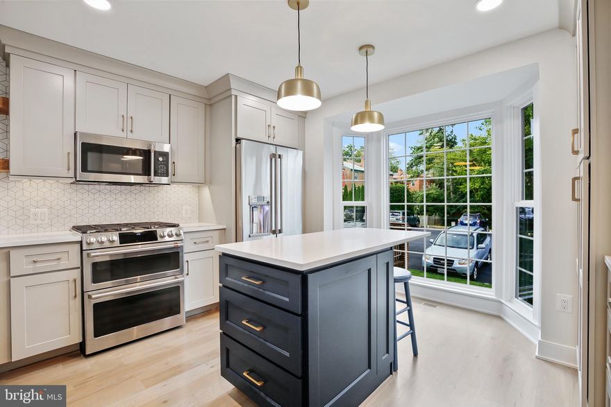 Rarely available, fully renovated townhome with designer finishes in the heart of Vienna. This 4-bedroom, 3.5-bath home spans three finished levels and has been completely updated from top to bottom within the past few years. Located in the desirable Wolftrappe Square community this bright, open main level showcases beautiful hardwood floors and a thoughtfully redesigned floor plan. The eat-in kitchen features a full-height bay window, abundant cabinetry, quartz countertops, stainless steel appliances, a gas 6-burner range with double oven, built-in microwave, and a center island. The adjacent dining room includes crown molding and chair rail and flows seamlessly into the spacious living room with built-ins and oversized windows.

The upper level offers hardwood floors throughout, three bedrooms, and two full baths. The primary suite is generously sized with a bay window and an updated en-suite bath.

The finished lower level includes a large recreation room and access to a private, fully fenced rear patio. The stone patio is ideal for entertaining, grilling, or relaxing and opens directly to lush HOA common grounds, providing low-maintenance outdoor enjoyment. A bonus room, full bath, and laundry room with brand NEW washer and dryer complete this level.

Additional features include two-zone HVAC for efficient heating and cooling. Ideally located close to Vienna shopping, dining, and daily conveniences, with easy access to Routes 123, 7, I-66, and I-495. Just 0.6 miles to the W&OD Trail and approximately 1.5 miles to Greensboro and Spring Hill Metro stations.