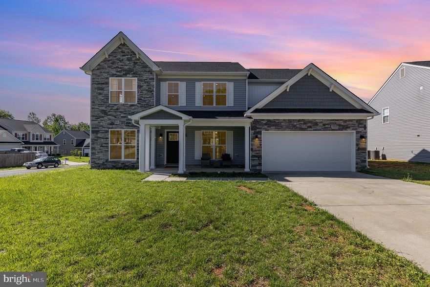 Welcome Home to this beautifully maintained 5-bedroom, 2.5-bath home built in 2021, situated on a premium lot. This property features luxury vinyl plank flooring throughout, architectural shingles, and a stylish vinyl and stone front exterior. The spacious main level includes a bedroom, half bathroom, laundry room, living room and dining room, and an oversized 2-car garage. The large primary suite boasts direct access to an upstairs loft—perfect for entertainment or a private retreat. Enjoy modern finishes including stainless steel appliances, granite countertops, and a back patio ideal for outdoor relaxation. A home warranty is included for added peace of mind. Book your showing today—this is a must-see home!