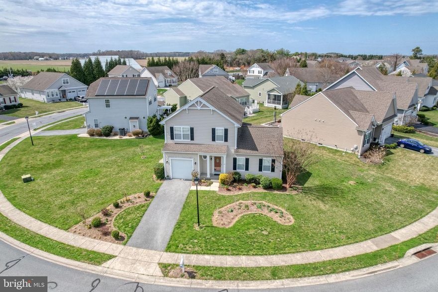 Welcome to Summercrest, a sought-after community ideally located close to Route 1 conveniences, yet tucked away in a quiet community within the Cape Henlopen School District. This well-maintained 4-bedroom, 2.5-bath home offers the perfect blend of space, functionality, and a convenient location. The open floor plan with seamless flow between the living, dining, and kitchen areas is ideal for both everyday living and entertaining. A versatile formal dining room with doors leading to the rear deck could easily transition into a relaxed living space. The main level features a spacious first-floor primary suite with private bath, a powder room,  and open living area. Upstairs, you'll find three additional bedrooms, a full bath and laundry, providing plenty of room for guests. The full unfinished basement provides abundant storage or the opportunity to customize and finish to suit your needs. Outside, unwind on the rear deck overlooking a nicely sized lot with an underground sprinkler system for easy lawn maintenance. Additional highlights include a one-car attached garage, natural gas fireplace, central air, and  public water and sewer. Enjoy a short walk to Summercrest's  community amenities including a clubhouse, outdoor pool, and tennis court, all with a low quarterly HOA fee. Ideally located just minutes to Rehoboth Beach and Lewes, as well as shopping, dining, coastal attractions, this home delivers comfort, convenience, and the coastal lifestyle in one of Sussex County’s most desirable areas. Make your plan to see it today!