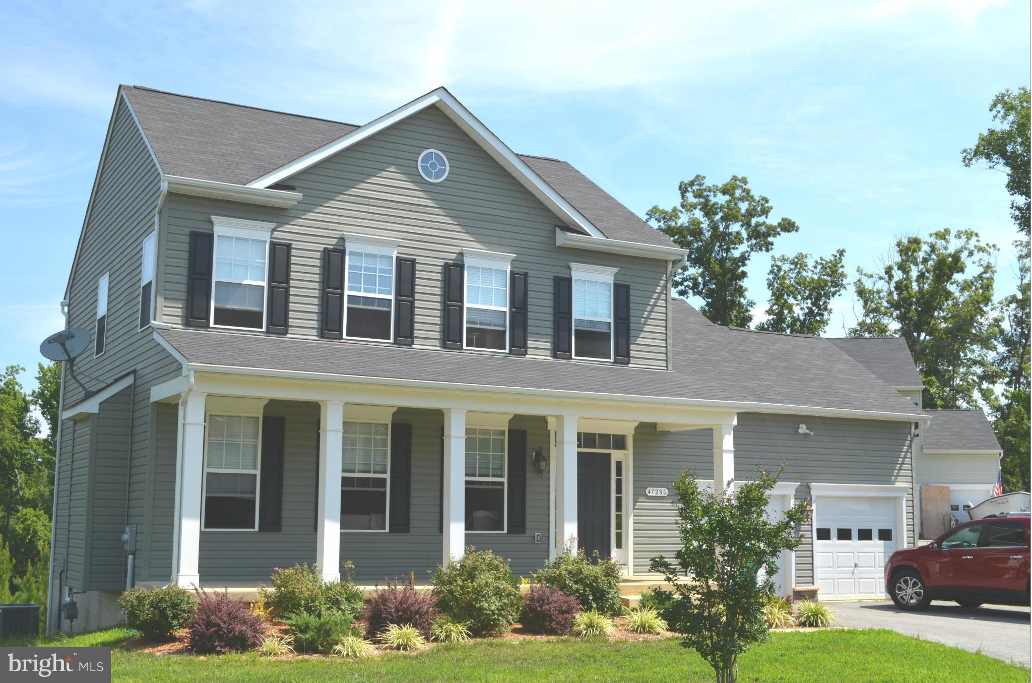 A quiet cul-de-sac is the setting for this 3 bedroom, 2 1/2 bath colonial. Spacious front porch and rear deck, expansive kitchen/breakfast area, two car garage with auto openers and unfinished basement. New Gas hot water heater Just minutes from Gate #3 Pax River NAS