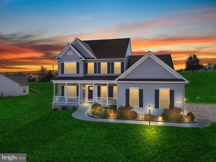 Nestled in the serene community of Stone Ridge Estates, this charming Colonial-style home offers a perfect blend of modern comfort and timeless elegance. Built in 2022, this residence boasts a spacious layout with 4 bedrooms and 3.5 bathrooms, making it an ideal retreat for those seeking both space and style. Step inside to discover a warm and inviting interior featuring beautiful hardwood and ceramic tile flooring throughout. The open floor plan seamlessly connects the kitchen and family room, creating a perfect space for gatherings and everyday living. The kitchen is a chef's dream, equipped with stainless steel appliances, a gas range, and an island that invites casual dining. Enjoy your morning coffee in the breakfast area or entertain guests in the formal dining room adorned with crown moldings and chair railings. The primary suite is a true sanctuary, complete with a walk-in closet and a spa-like bathroom featuring a walk-in shower. Outside, the property sits on a generous 2.04-acre lot, featuring a cleared front and rear yard, perfect for outdoor activities or gardening. The side-entry attached garage provides convenient access, while the outbuilding offers extra storage for tools or toys. Enjoy evenings on the inviting porch, where you can unwind and take in the peaceful surroundings. Stone Ridge Estates is not just a place to live; it's a community that fosters connection and easy commuting convenience. Although you live in a community that fosters connection, there's NO HOA.  Residents benefit from nearby parks, perfect for leisurely strolls or picnics, that enhance the neighborhood's appeal.  This home is more than just a property; it's a place where memories are made, and a community where you can truly feel at home. Experience the perfect blend of comfort, style, and community in this delightful residence.