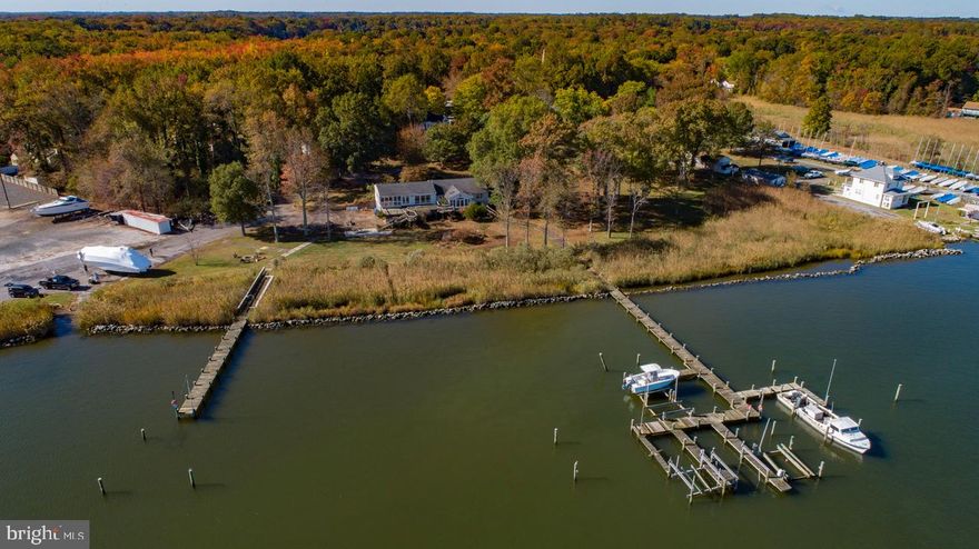 PRICE REDUCTION - FANTASTIC OPPORTUNITY to own 3.58 PRIVATE ACRES with 732 FEET of WATER FRONTAGE  with existing Rip Rap on Selby Bay off the South River - AMAZING OPPORTUNITY to Renovate or Build an Estate Type  Dream Home!  Incredible Water Views from the existing  4100 sq ft home .  New 8' privacy fence installed  on the right side of the property as you face the water. Property has 2 Piers, 5 electric Boat Lifts, Helicopter Pad and a Boat Ramp.  Home is being SOLD AS IS and the value is in the 3.58 acres of waterfront land.  Land is zoned MA2 and MC which gives you many opportunities for potential extra income.  NO HOA to deal with. These OPPORTUNITIES do not come up often so set up a private showing now !