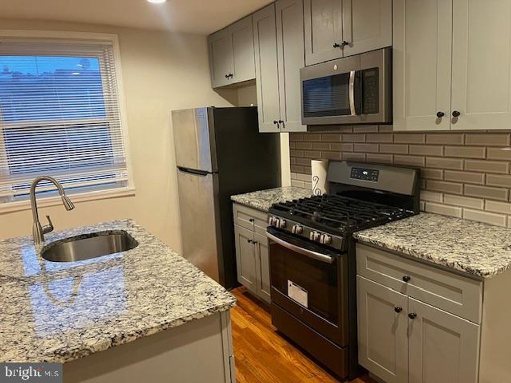 Photo of 5221 N 8th Street #1ST FLOOR, PHILADELPHIA, PA 19120 (MLS # PAPH2565286)