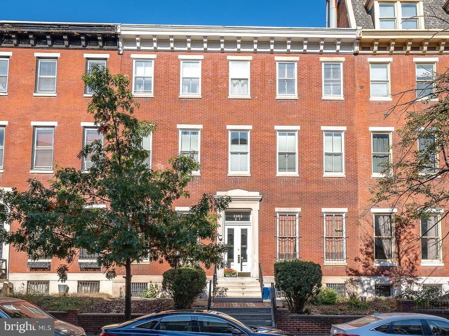Welcome to 1503 Green Street! Situated on a beautiful tree lined street in an historical original classic building, you'll find great natural light and gorgeous original touches in both the common space and inside this fabulous light filled one bedroom unit. The open floor plan and the overall layout gives a feeling of even more space than the already generous sized rooms. A wood burning fireplace and built-ins add to the cozy feel of the living room with the dining area and kitchen adding the great flow. The kitchen has the perfect "cook friendly" layout with ample countertop and cabinet space for every day and entertaining kitchen needs! A convenient washer/dryer area is tucked away here too. A fantastic large deck sits off the kitchen, perfect  for grilling, relaxing, and/or entertaining! City views and a peak of the river an added bonus. Through the hall, you'll find the bedroom, bath, and closets. The bedroom is very spacious and also offers good natural light. The wardrobe closet is included. The bathroom highlights the unique character of the original style and millwork of the property. A newer stall shower and frameless glass doors add a nice modern touch. There's a private storage unit in the basement too. Some furniture included. Convenient to so much that this desirable area has to offer including Whole Foods, Giant, Phila Art Museum, Barnes Foundation, Rodin Museum, parks, public transportation, restaurants, shopping and SO much more! Come take a look..it could be just right for you!