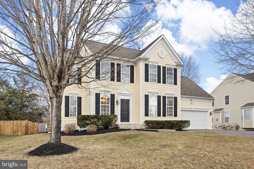 Welcome to your DREAM HOME! 
This beautifully remodeled 4-bedroom, 3.5-bath luxury residence in The Estates at Walnut Hills of Spotsylvania County is a virtually new home with extensive 2025/ 2026 updates and timeless, high-end finishes throughout.
From the moment you enter the beautiful light-filled  foyer, you’ll notice the attention to detail: crown molding, freshly painted interiors throughout, updated fixtures, and beautiful hardwood flooring. The open-concept design seamlessly connects the living room and kitchen, anchored by a stunning stone gas fireplace and designed perfectly for entertaining. The chef’s kitchen features brand-new gorgeous quartz countertops, upgraded premium luxury style stainless steel appliances including six burner gas range,  freshly painted white kitchen cabinets, new luxury vinyl tile flooring, and a bright eat-in area off of the kitchen. A formal, elegant dining room with custom moldings offering the perfect setting for gatherings, while a convenient main-level half bath adds everyday functionality. A cozy office nook just off the living room provides flexible work-from-home space. Upstairs, the luxurious primary suite is a true retreat with its refinished hardwood floors (2026), private second-story deck,  spacious walk-in closet, SPA-INSPIRED en-suite bath featuring dual vanities, a soaking tub, a glass enclosed shower. In addition to the primary suite, there are three generously sized bedrooms upstairs, including a room-over-the-garage that offers exceptional space and flexibility. This oversized bedroom features beautifully refinished hardwood floors (2026) and is ideal as a guest suite, secondary primary suite, playroom, or additional living space. The fully finished basement expands your living space with a large media/flex room, a dedicated office or bonus room, a custom wet bar, abundant storage, and even a private basement entrance — ideal for entertaining, guests, or multi-generational living. Step outside to your beautifully designed backyard oasis featuring: Newly stained double-tier deck, private gazebo, fully fenced back yard,  Amazing backyard that's perfect setting for evening gatherings and outdoor entertaining. Additional highlights include hardwood flooring throughout the top two levels, new luxury vinyl tile in the kitchen and baths, upgraded fixtures throughout the home, 2025/2026 updated bathrooms, fresh interior paint throughout the home, whole-house professional air duct cleaning 2026, new basement carpet, upstairs laundry area, extra-deep garage, and freshly painted exterior foundation. Every detail has been thoughtfully curated for beauty, comfort, and functionality. Conveniently located just minutes from shopping, dining, hospitals, I-95, downtown Fredericksburg, and the VRE for D.C. commuting, this move-in-ready home offers the perfect blend of luxury and accessibility. Completely turnkey. Beautifully updated. Ready to impress!