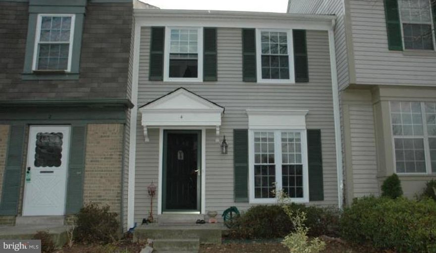 Well maintained, recently updated home ready for you!  Near 200, 95, and 29, as well as public transportation.  Hardwood floors, ceramic tile, stainless steel appliances and corian countertops in kitchen.   Parking space and quiet community. Fireplace in the living room and 2 TV's will come with the property.